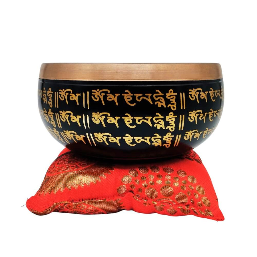 Meditation Singing Bowl on red cushion, front view